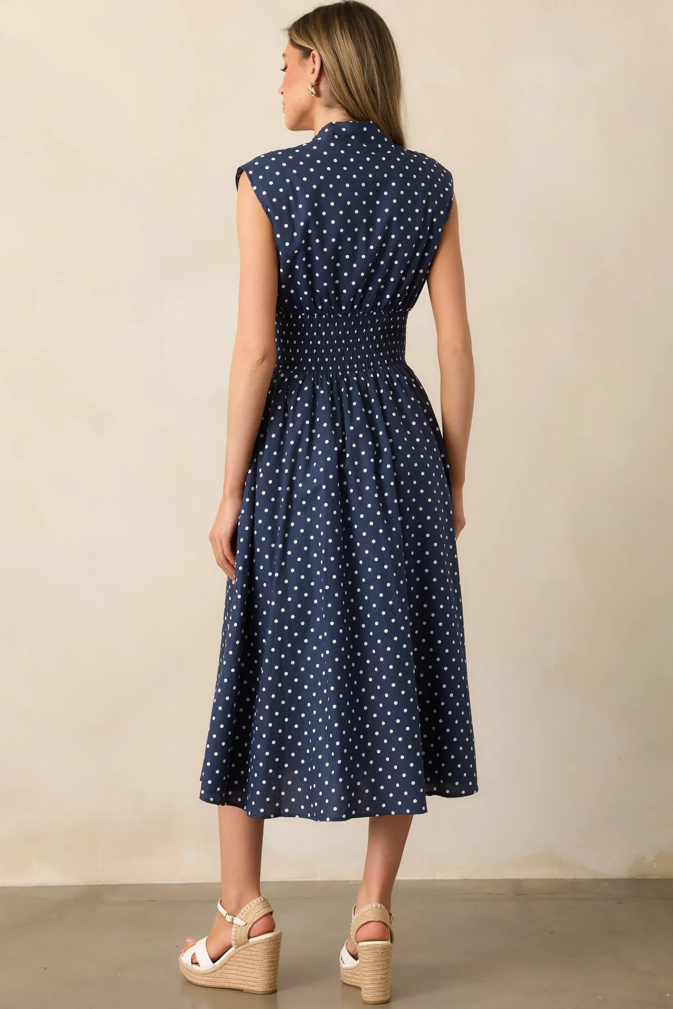 The Evette Navy Polka Dot Zip Front Midi Dress