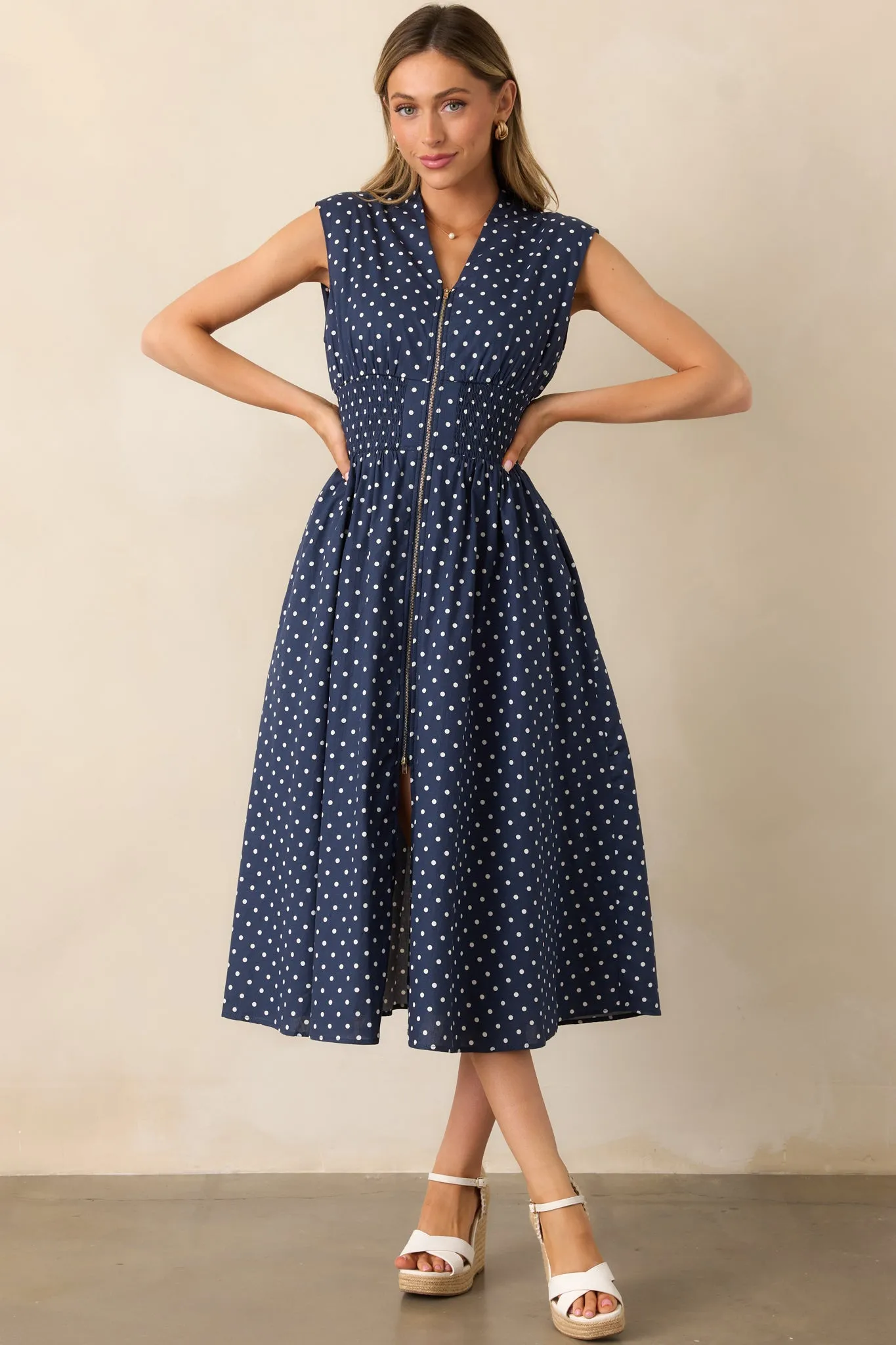 The Evette Navy Polka Dot Zip Front Midi Dress