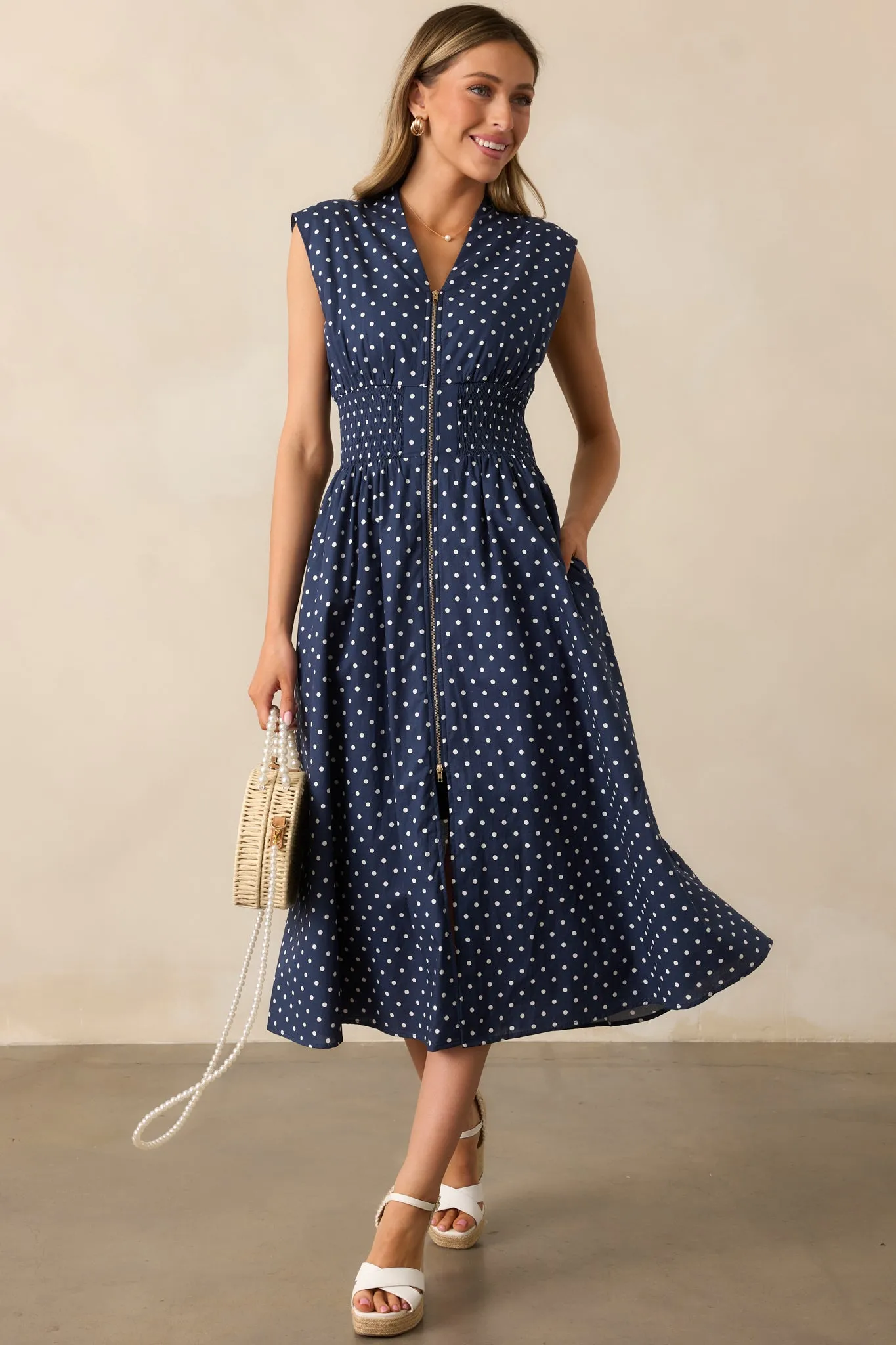 The Evette Navy Polka Dot Zip Front Midi Dress